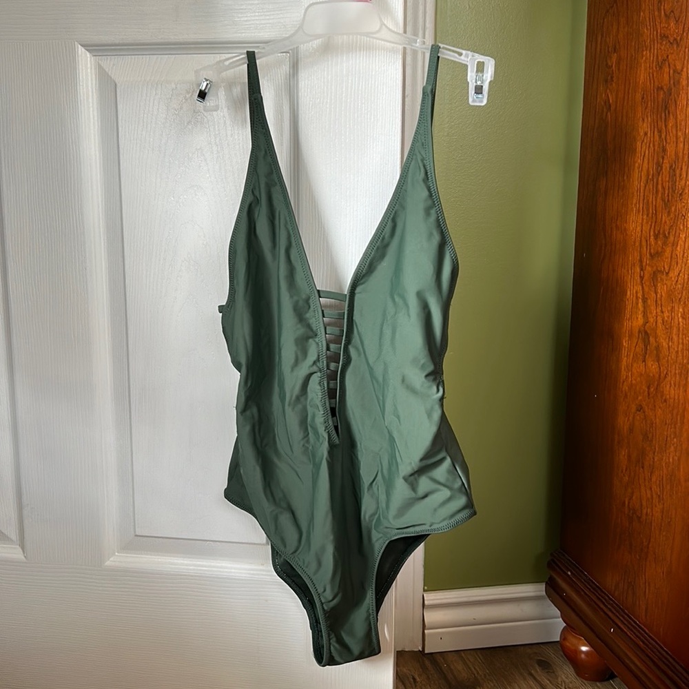 Green one piece bathing suit